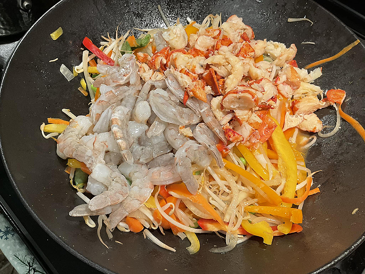 Recette de Stir Fry crevettes petoncles miel et ail