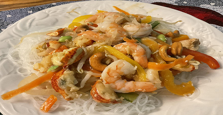 Recette de Stir Fry Crevettes Pétoncles Ail et Miel